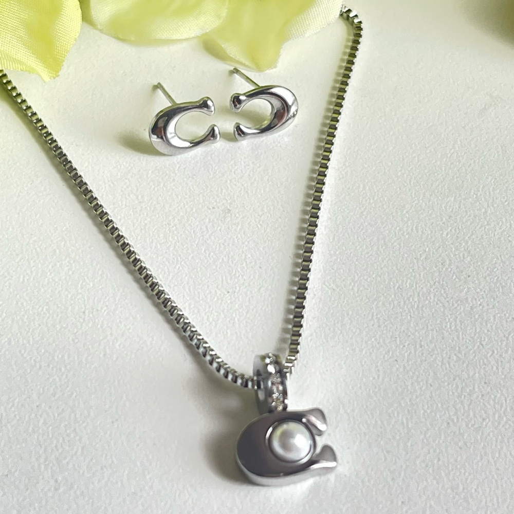 Coach Silver-Tone Necklace with Pearl Pendant and Hoop Earrings - Picture 3 of 7